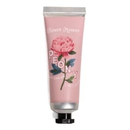 Pink hand cream tube with a peony illustration and Flower Market text