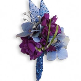 Purple and blue corsage with glittery accents
