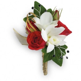 Red and white rose boutonniere with green leaves and gold ribbon
