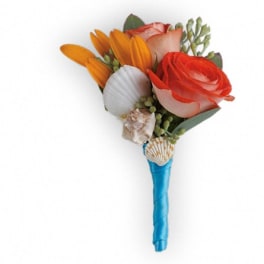 Small boutonniere with orange and coral flowers and seashell accents