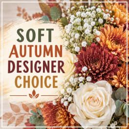 Autumn floral arrangement with cream roses, orange and burgundy blooms, and baby's breath