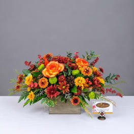 Orange roses and mixed fall flowers in a wooden box arrangement