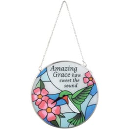 Round hanging plaque with a hummingbird and pink flowers