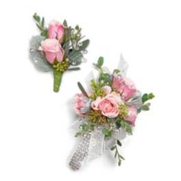 Pink rose boutonniere and matching wrist corsage with silver ribbon