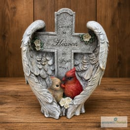 Angel-wing memorial cross with two birds and small flowers