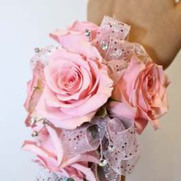 Pink rose bouquet with sparkly ribbon accents