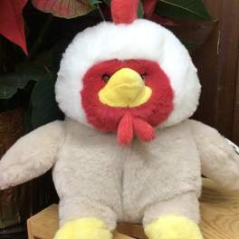 Plush chicken toy with red, white, and yellow features
