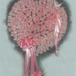 Large pink rose wreath with ribbon bows