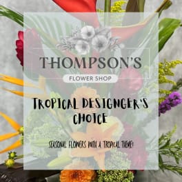 Tropical mixed bouquet with lilies and bright seasonal flowers