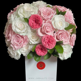 Pink and white rose bouquet in a white gift box