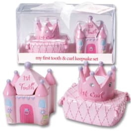 Pink castle-shaped keepsake boxes for a first tooth and curl