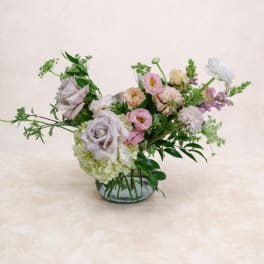 Mixed pastel bouquet in a clear glass vase