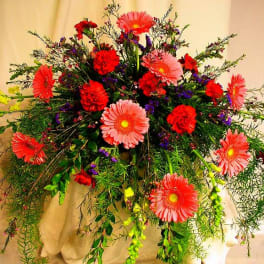 Large bouquet of pink gerbera daisies and red carnations