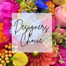 Bright mixed bouquet with pink, blue, orange, and yellow flowers