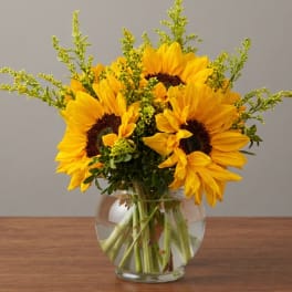 Sunflower bouquet in a clear glass vase