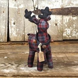 Plaid fabric reindeer figurine with a hanging tag