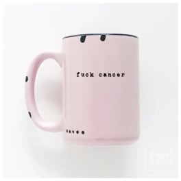 Pink mug with black text and dot accents