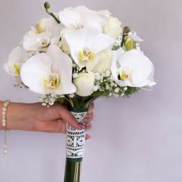 White orchid bouquet with lace-wrapped handle