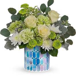 Cream roses and green-white mums in a blue mosaic vase
