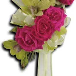 Pink rose and green orchid bouquet with ribbon