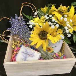 Sunflower arrangement in a wooden gift box with a lavender soap bar