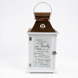 White memorial lantern with a printed sympathy message and bronze top