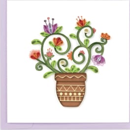 Decorative paper flower arrangement in a brown pot on a white card