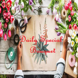 Bouquet of tulips arranged around a floral design board