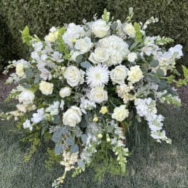 Large white floral spray with roses and hydrangeas