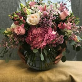 Pink and white mixed bouquet in a glass vase