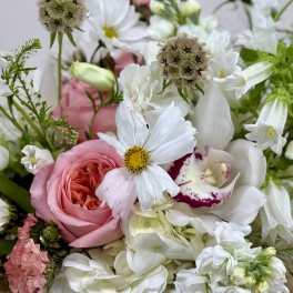 Pink rose bouquet with white flowers and green filler