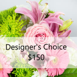 Pink and green mixed bouquet with lilies, roses, and daisies
