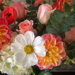 Mixed bouquet with pink roses, white daisies, and peach dahlias