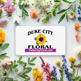 Duke City Floral logo card surrounded by assorted flowers on a white background