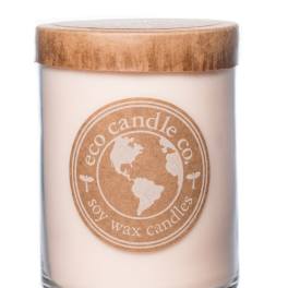 Soy wax candle in a glass jar with a wooden lid