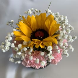 Sunflower bouquet with pink carnations and white baby's breath