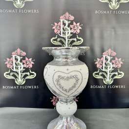 Decorative silver mosaic pedestal vase with a heart design