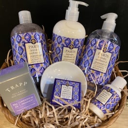 Basket of lavender-scented bath and body products with purple packaging