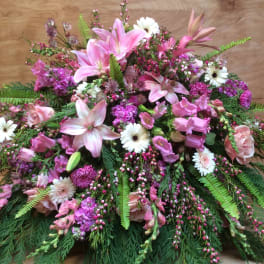 Large pink and white floral spray with lilies and daisies