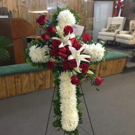 Standing floral cross with red roses and white flowers