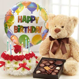Birthday gift set with teddy bear, balloon, cake, and chocolates
