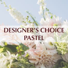 Pastel floral arrangement with pale pink and white blooms