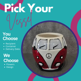 Decorative ceramic vase shaped like a red-and-white van