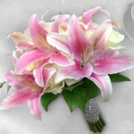 Pink and white lily bouquet with a jeweled handle wrap