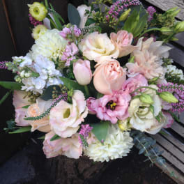 Pastel bouquet of roses, lisianthus, and chrysanthemums