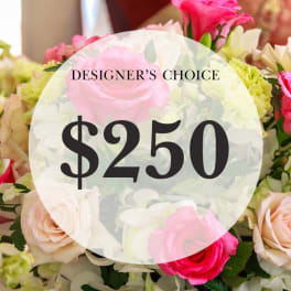 Mixed pink and white flower bouquet with a $250 designer's choice label