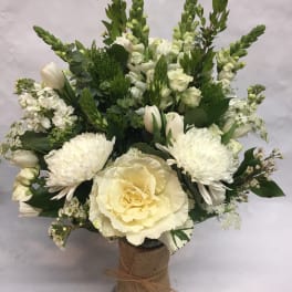 White floral bouquet with tulips, chrysanthemums, and a large cream rose