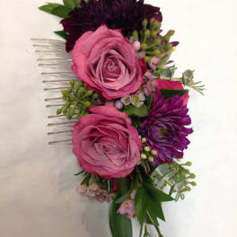 Pink and purple floral hair comb with roses and small blooms