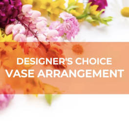 Designer’s choice vase arrangement with colorful flowers