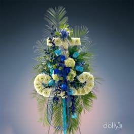 Tall floral standing spray with white and blue flowers